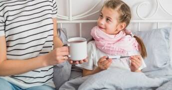 mother-taking-care-her-sick-daughter