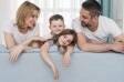 Family spending quality time together at home, symbolizing nurturing and happy parenting
